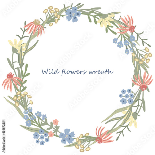 Herbal  round frame or wreath decorated with wild or meadow flowers.  Summer floral design. Great for greeting card, posters, blog decorating. Hand drawn vector illustration isolated on white. © Anna Druzhkova