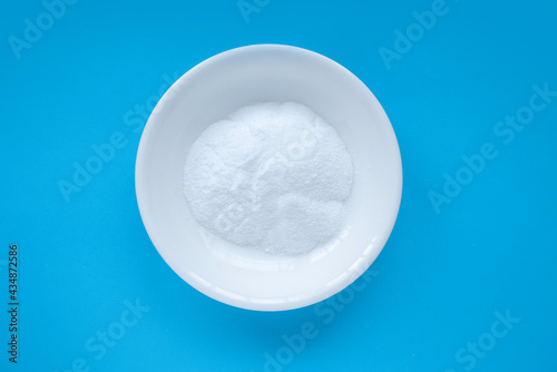 ORS or oral rehydration salt on blue background.