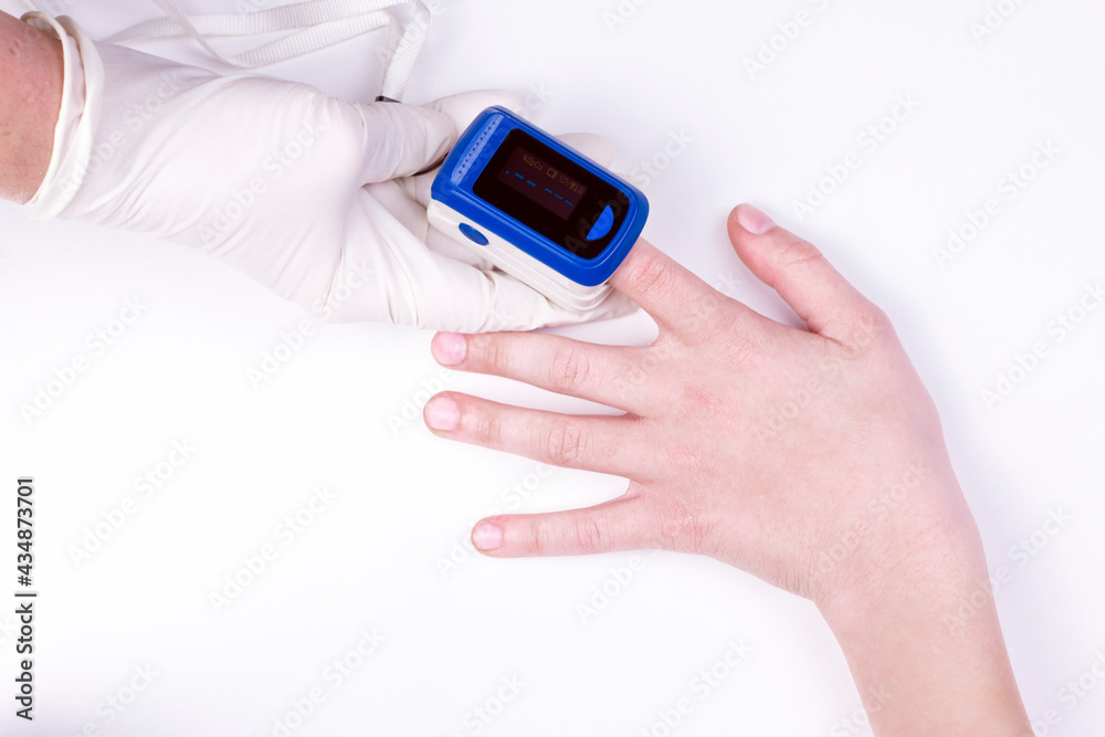 Doctor hand in white medical latex gloves hold patients hand with pulse oximetry on the finger. Noninvasive and painless oxygen saturation level test. Part of set. Doctor hand in white medical latex gloves hold patients hand with pulse oximetry on the finger. Noninvasive and painless oxygen saturation level test. Part of set.