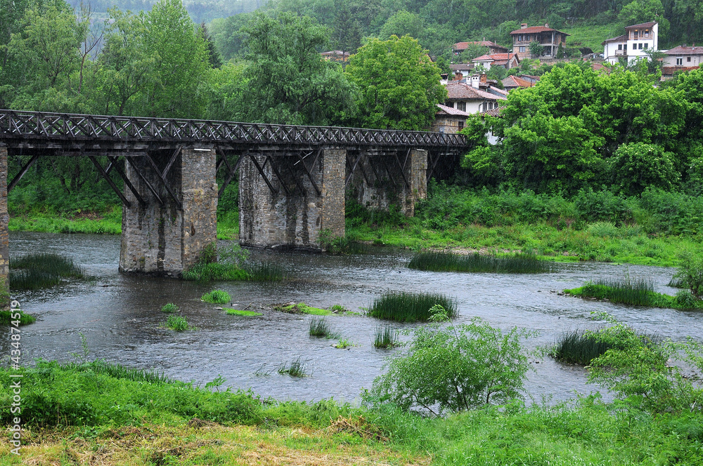 View of Vladishki wooden bridge in spring View of Vladishki wooden bridge in spring