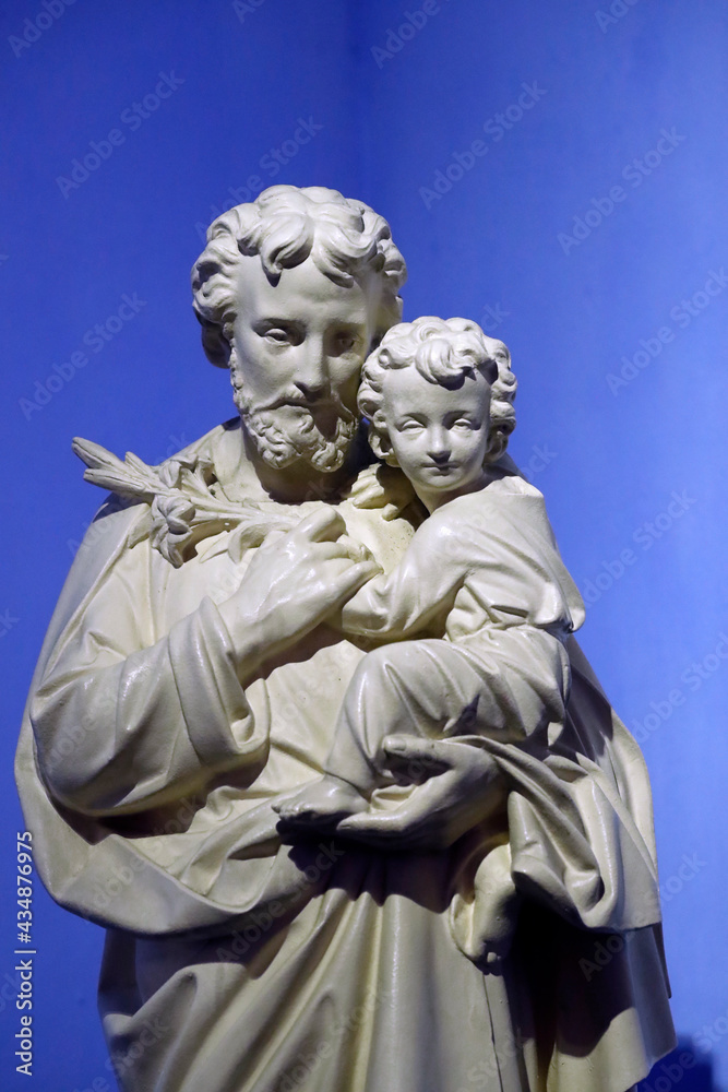 Aix en Provence cathedral.  Saint Joseph with infant jesus in arms. Statue. Aix en Provence. France.