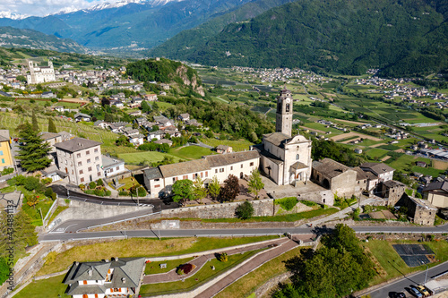 aerial view of the village of Poggiridenti and the church of San Fedele in Valtellina, Italy photo