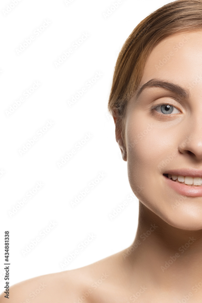 Close up portrait of young female fashion model isolated on white studio background. Beautiful caucasian woman with well-kept skin. Close up portrait of young female fashion model isolated on white studio background. Beautiful caucasian woman with well-kept skin.