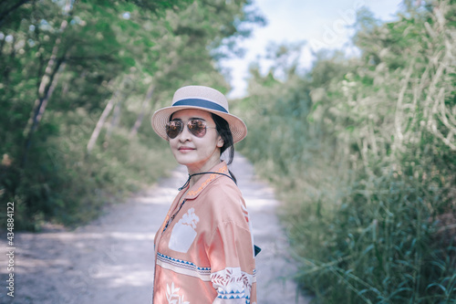 person sitting on a rock