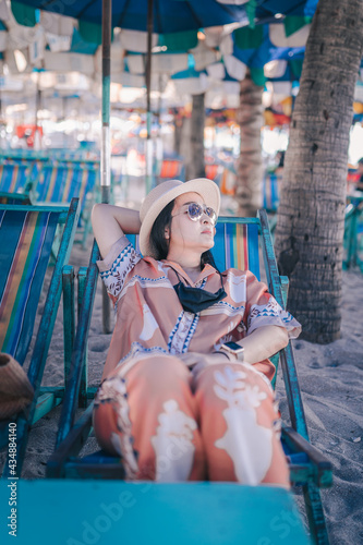 person sitting on a rock