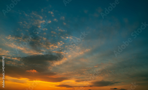 Fototapeta Naklejka Na Ścianę i Meble -  Beautiful colorful sunset sky with clouds and sunlight.