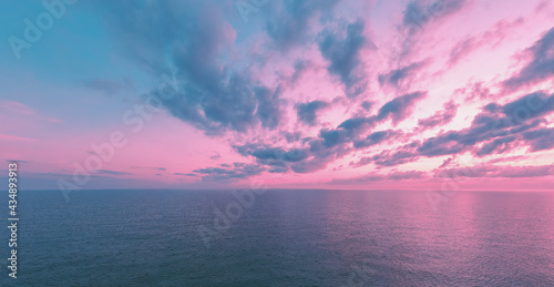 Seascape in the evening. Sunset over the sea with beautiful sky. Horizontal pano © vvvita