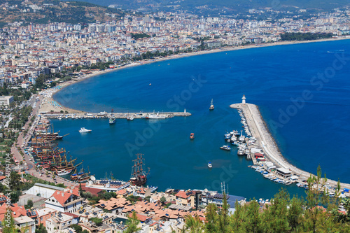 Alania. Turkey. View of the harbor and from the fortress. At the pier fishing boats and pleasure boats