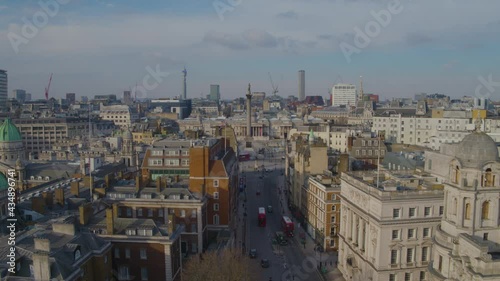 Aerial drone view over London tracking across Whitehall looking towards Nelson's Column and Trafalgar Square photo