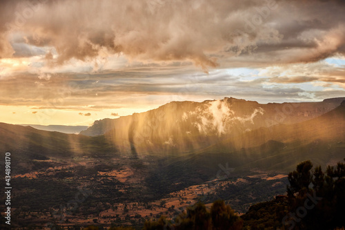 Tableau sur toile Aerial, dramatic view on illuminated rain over slopes of Bale mountains covered in Harenna forest, Ethiopia, Africa