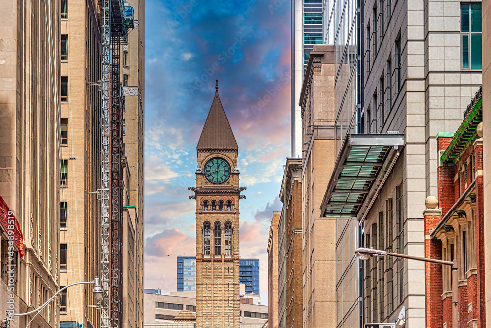 Old City Hall clock tower is seen from Bay Street, Toronto, Canada