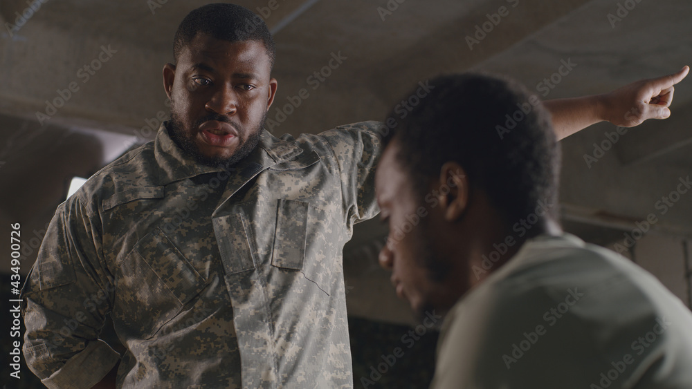 African American commander scolding soldier African American commander scolding soldier