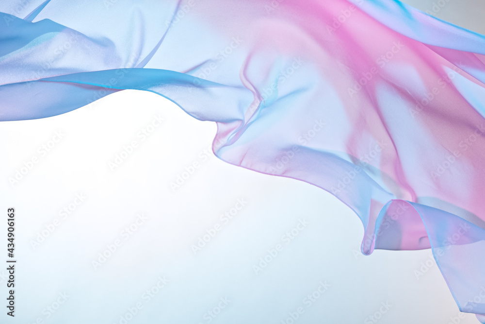 Smooth elegant colorful transparent cloth separated on white background. Texture of flying fabric. - obrazy, fototapety, plakaty 