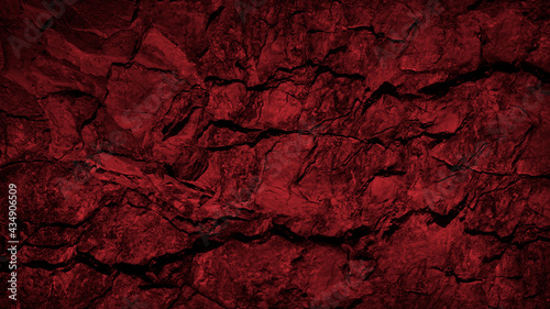 Black red grunge background. Toned rock texture. Dark red stone background with copy space for design. Web banner. Horror, spooky, scary, creepy, Halloween concept.