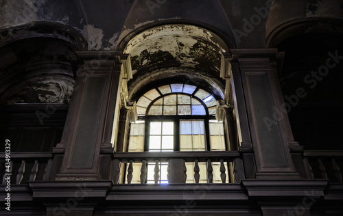 window in a abandoned church. Interior architecture of old building.