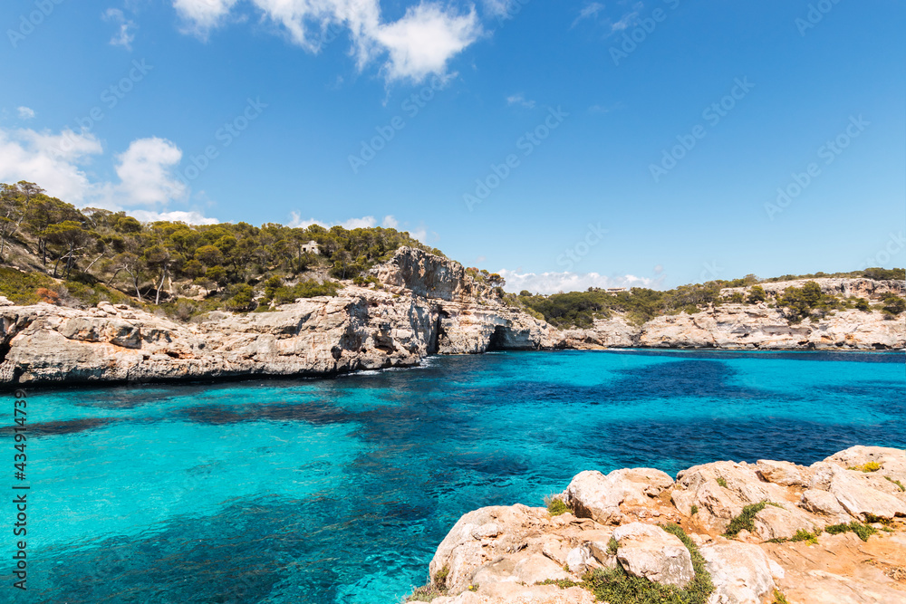 calo des moro, turquoise water from a cliff. mallorca, spain