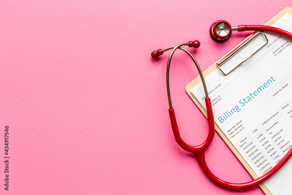 Fototapeta premium Stethoscope with medical billing statement. Top view
