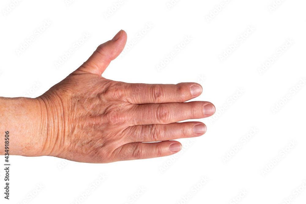 Hand of elderly Caucasian woman with Heberden's arthritis at the index finger on white background. Sign of osteoarthritis. Hand held out for handshake despite pain. - obrazy, fototapety, plakaty 