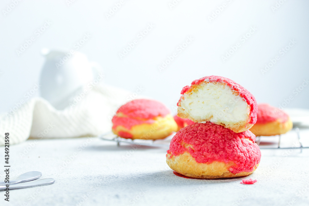 Red velvet craquelin choux (crispy cream puffs). Delicious French Choux Pastry Dessert with Tiger motifs on Top (Craquelin). selective focus. Red velvet craquelin choux (crispy cream puffs). Delicious French Choux Pastry Dessert with Tiger motifs on Top (Craquelin). selective focus.