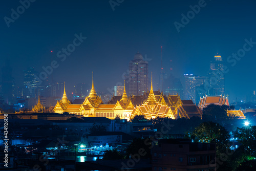 Bangkok Grand palace and Wat Phra Kaew surround by modern buildings, in Bangkok, Thailand