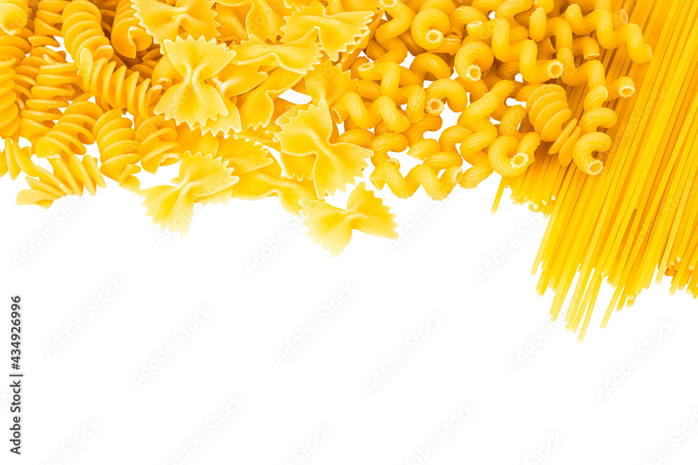 Variety of types and shapes of Italian pasta on white background. Top view with copy space