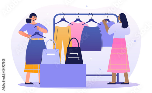 Two female merchandisers are working in a shop together