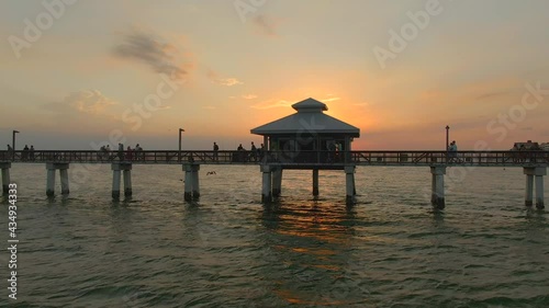 Stunning sunset at Fort Myers Beach Pier, 4k Aerial