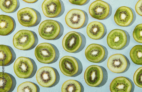 Fototapeta Naklejka Na Ścianę i Meble -  Collection of kiwi slice fruits overhead view flat lay