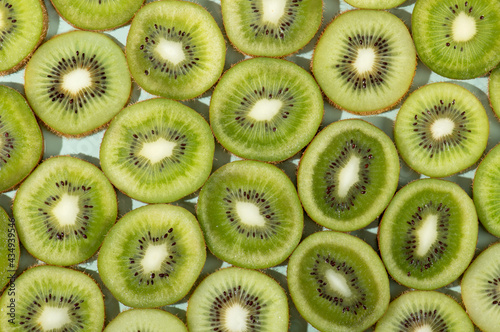 Fototapeta Naklejka Na Ścianę i Meble -  Collection of kiwi slice fruits overhead view flat lay