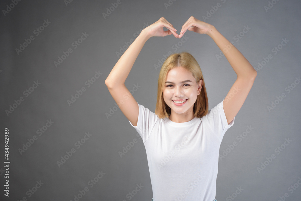 portrait of short blonde hair woman in studio portrait of short blonde hair woman in studio