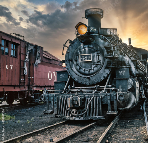 Steam locomotive. Train. On steam. Chama New Mexico USA. Rio Arriba County. Cumbres and Toltec Scenic Railroad. Sunrise.