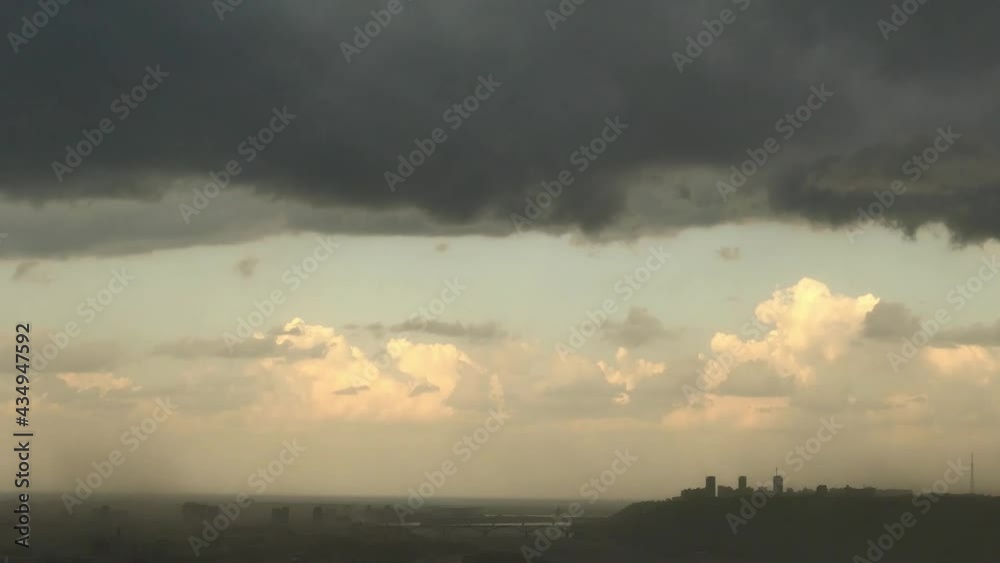 Rain t storm cloud in the city. Dark big cloud in the sky. Rain t storm cloud in the city. Dark big cloud in the sky.