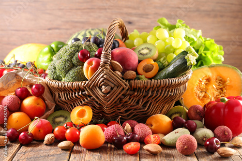 Fototapeta Naklejka Na Ścianę i Meble -  fruits and vegetables on wood background