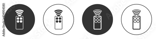 Black Remote control for the camera icon isolated on white background. An auxiliary device that allows you to work with a camera from a distance. Circle button. Vector