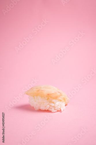 Nigiri sushi on pink background