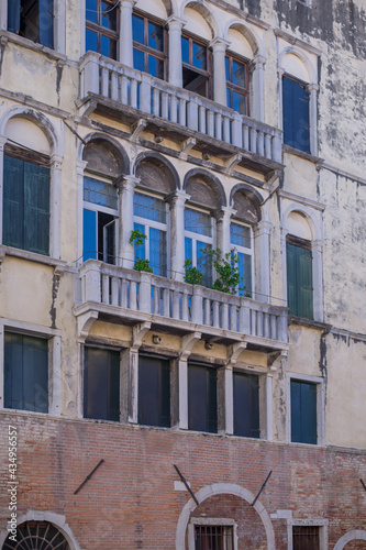 facades of the narrow streets of the old city of Venice