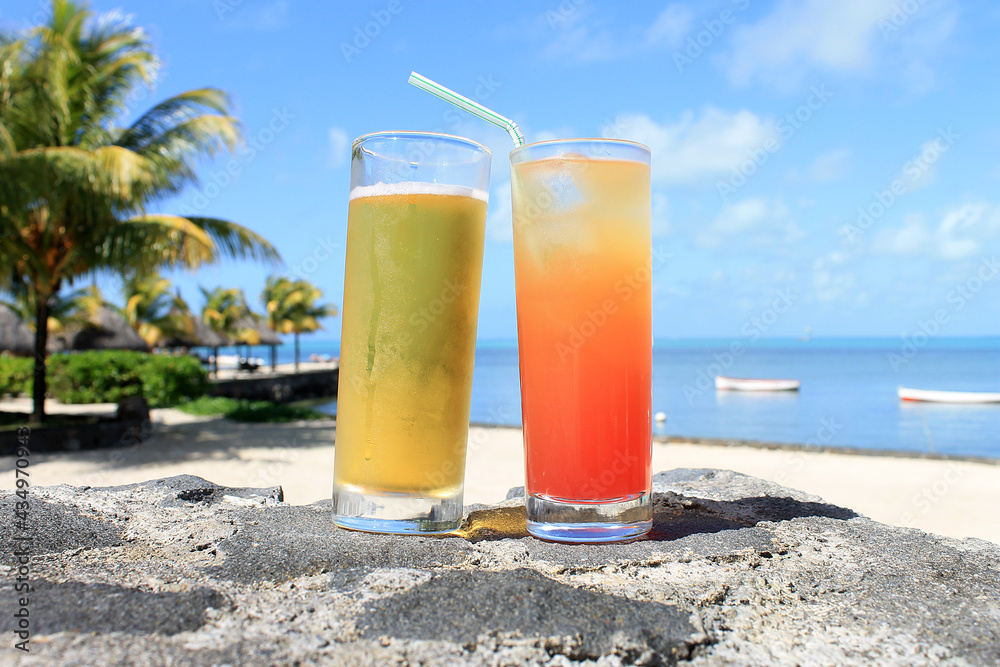 Obraz premium Designer Drinks Closeup with Beach in Background