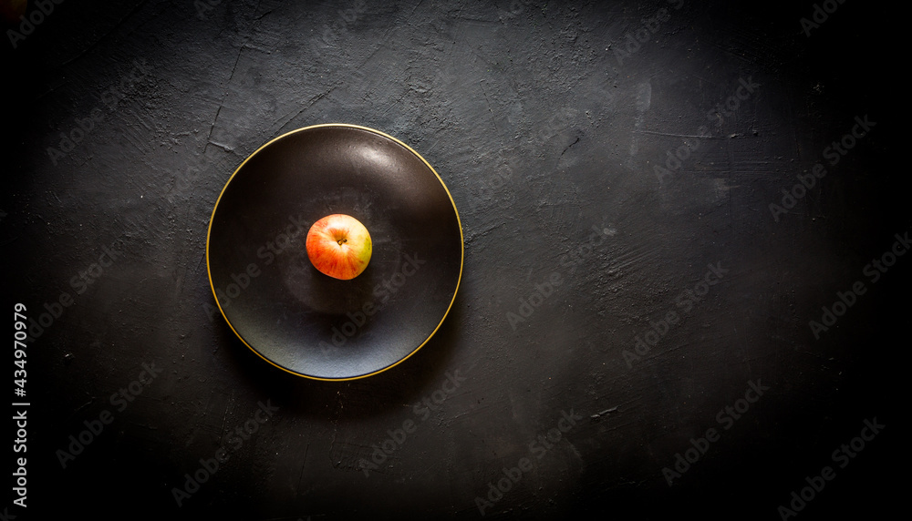 Obraz premium Apples-pear served on the plate on the table