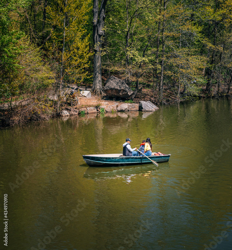 boat on the lake family vacation beautiful park water green tree 