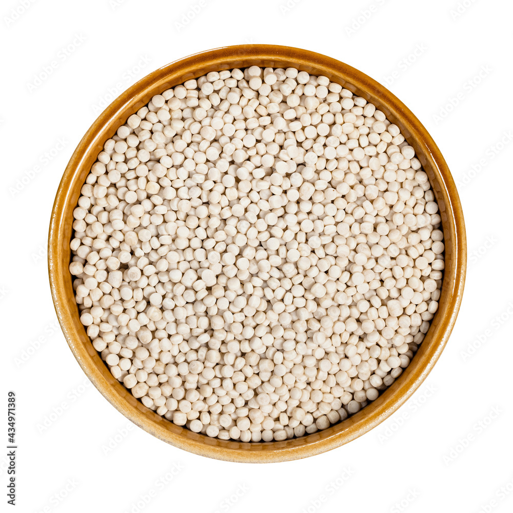uncooked ptitim (pearl couscous) in bowl cutout uncooked ptitim (pearl couscous) in bowl cutout