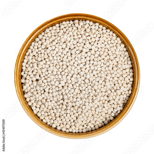 uncooked ptitim (pearl couscous) in bowl cutout