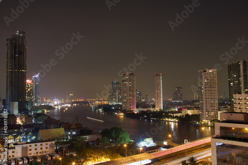 bangkok night skyline with river and skyscrapers
