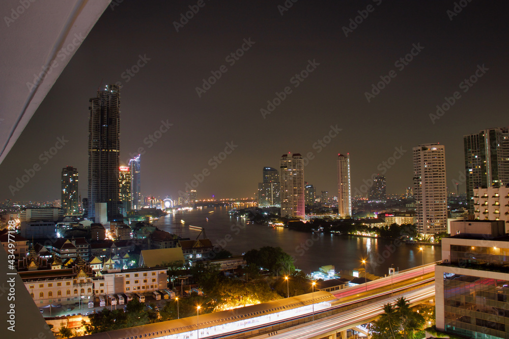 Fototapeta premium bangkok night skyline from a balcony