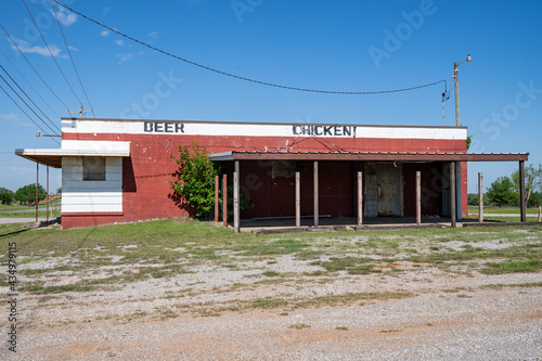 Yukon, Oklahoma - An old abandoned beer and chicken diner restaurant is closed along Route 66 photo