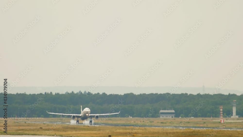 Passenger plane landing at the airport Passenger plane landing at the airport