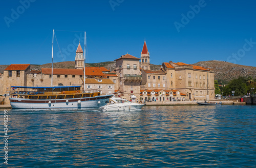 Trogir, Croatia. Sunny promenade along the pier of old Venetian town, Dalmatian Coast in Croatia. September 2020