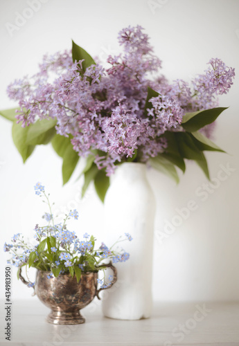 Vintage still life of lilac and forget-me-nots  flowers, Springtime