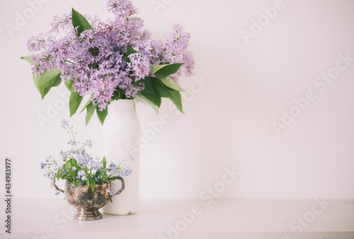 Vintage still life of lilac and forget-me-nots  flowers  Springtime