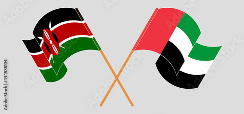 Crossed and waving flags of Kenya and the United Arab Emirates
