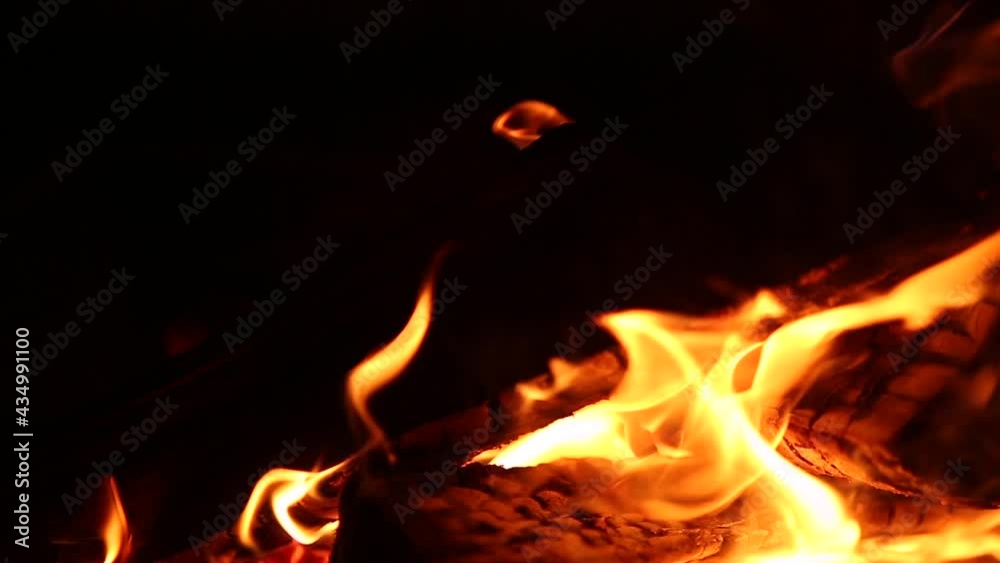 yellow flame, bonfire on black background, fire in the dark yellow flame, bonfire on black background, fire in the dark